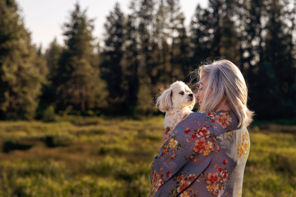 Why the Inland Northwest aches for dog photos 4 a woman holds her senior cockapoo at Turnbull National Wildlife Refuge in Cheney, Washington